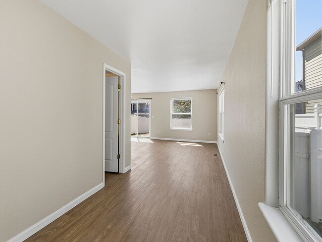 Building Photo - Recently Refreshed 3 Bed, 2.5 Bath Duplex with Fenced Yard — Available Now in Evans, CO!