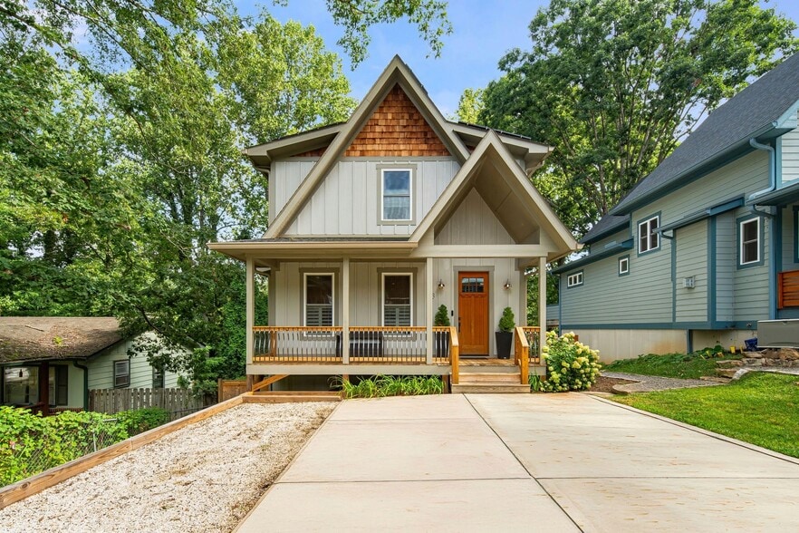 Front of modern 2021 green-built home with 3 off-street parking spaces. - 33 Rex Dr
