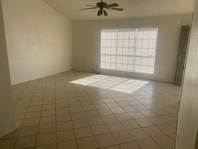 Building Photo - Four Bedroom Two Bath Vaulted Ceilings