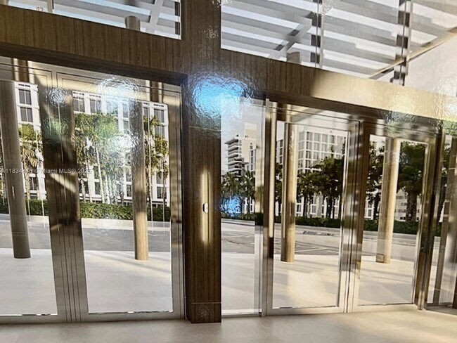 Building Photo - 10185 Collins Ave