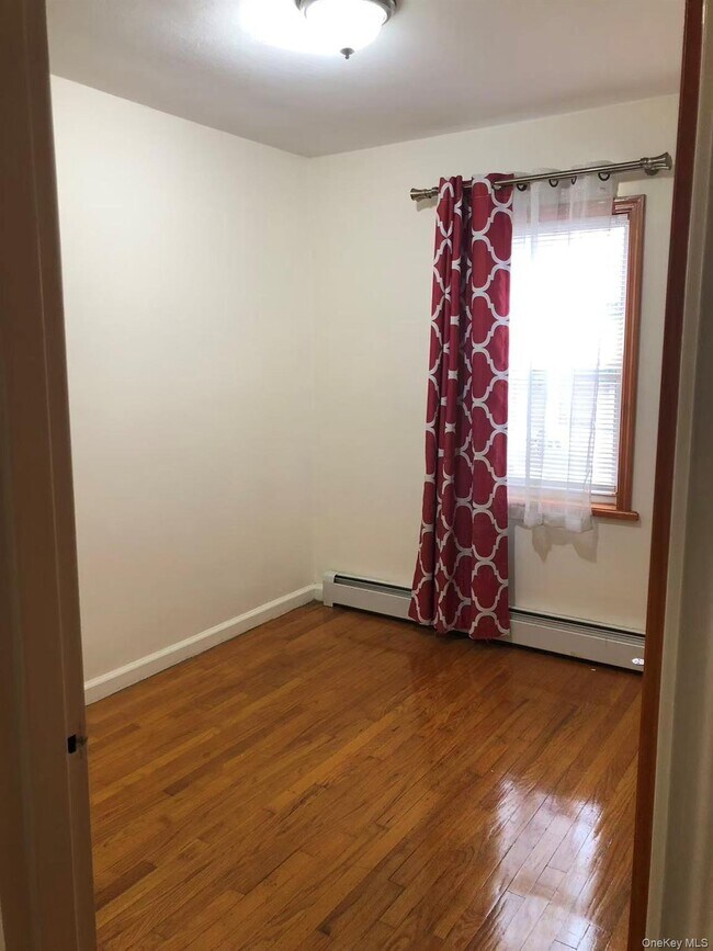 Building Photo - 229-02 Horace Harding Expy