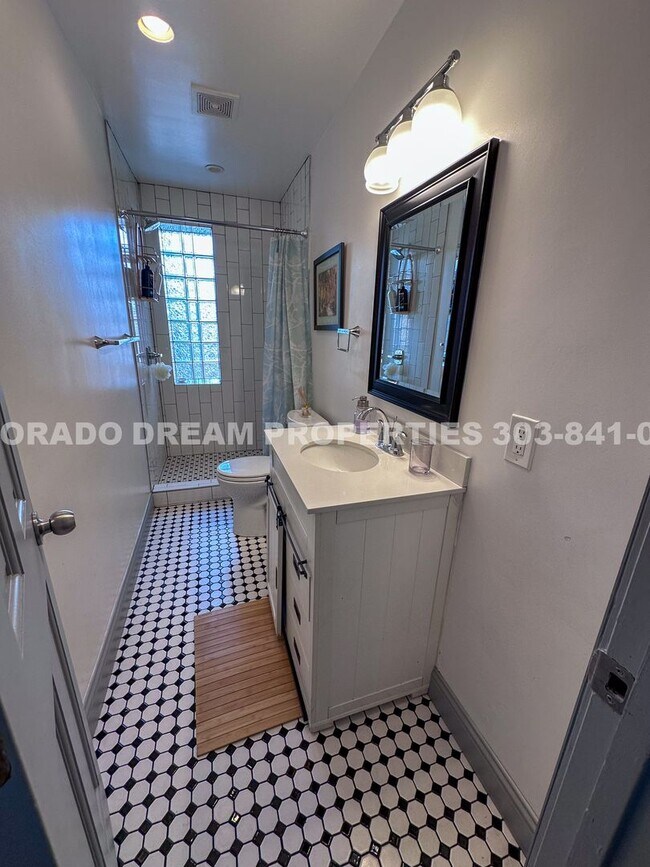 Building Photo - A home where old-world charm meets modern sophistication!