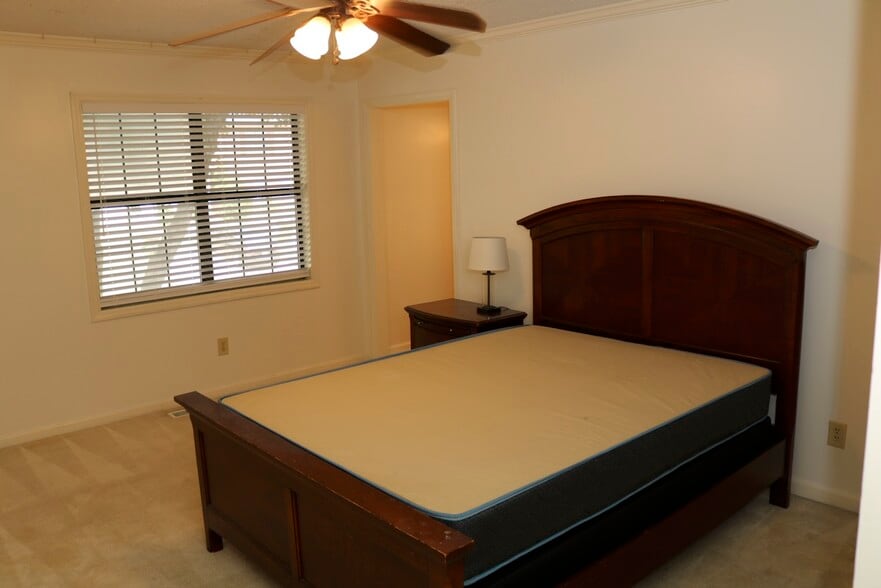 Bedroom 2 looking out onto Sand Wedge Circle. - 7005 Sand Wedge Cir