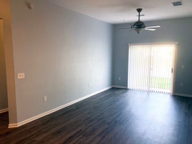 Building Photo - Spacious 3-Bedroom Condo with Pond Views &...