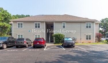 Building Photo - Open and Inviting End Unit
