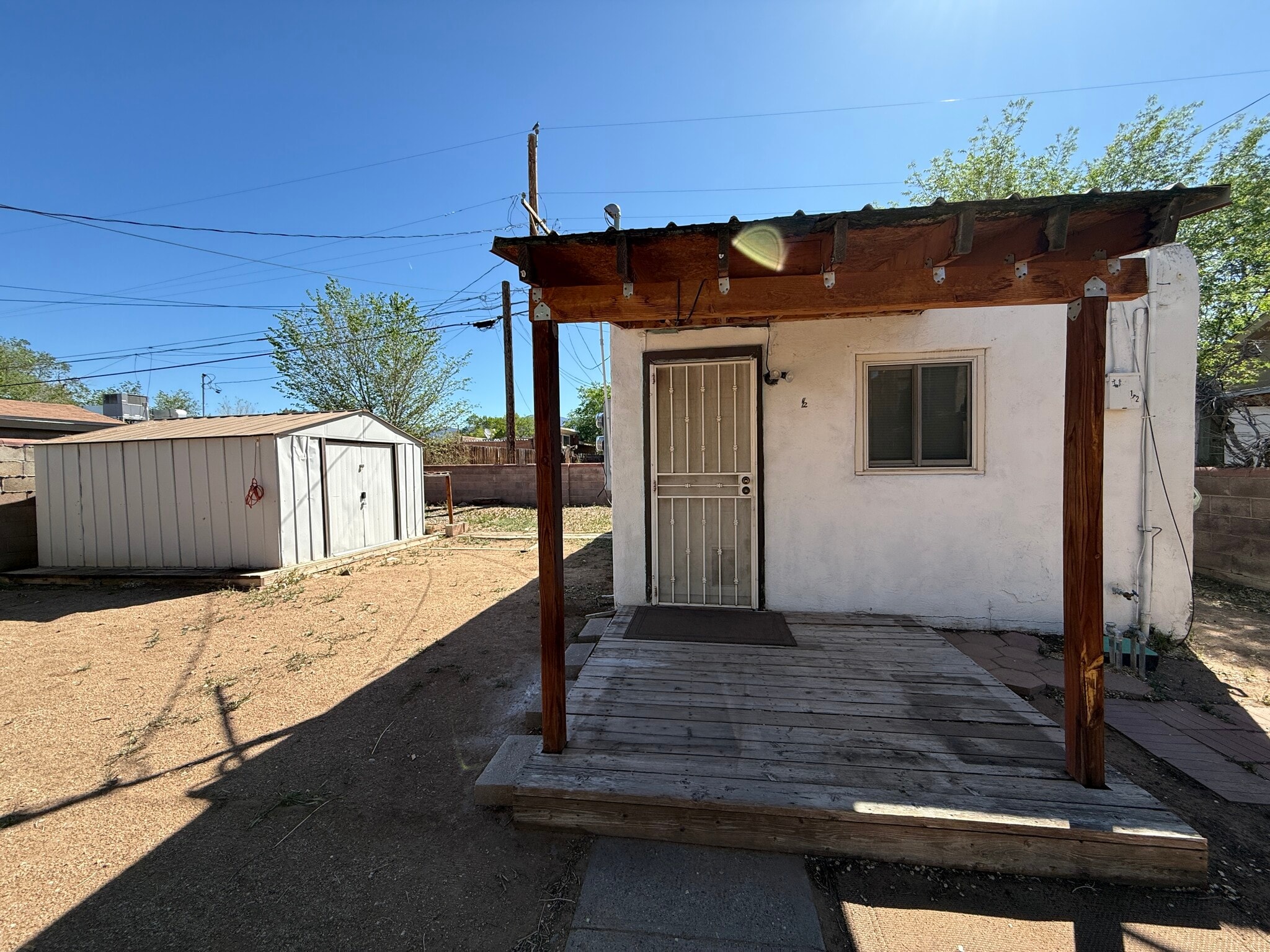 Exterior Including Storage Shed - 208 Chama St NE