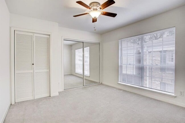 Building Photo - Beautifully remodeled two-story condo in a...