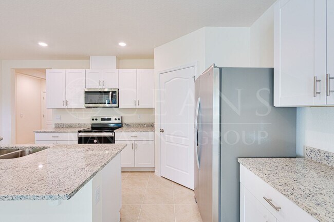 Building Photo - Never Lived in 4 Bed, 2 Bath Ormond Home with Upgrades and a Fenced Yard