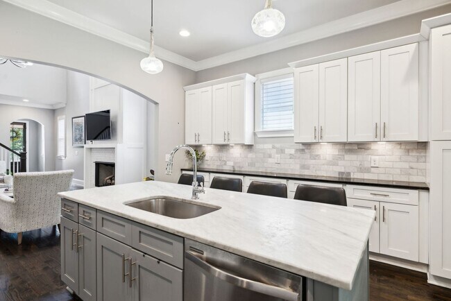 Building Photo - Welcome to this beautifully designed 4-bed...