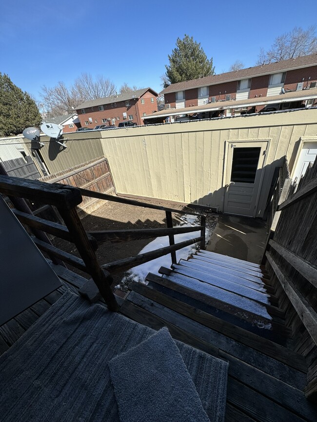 out back door, small backyard, access to garage - 1418 Kay St