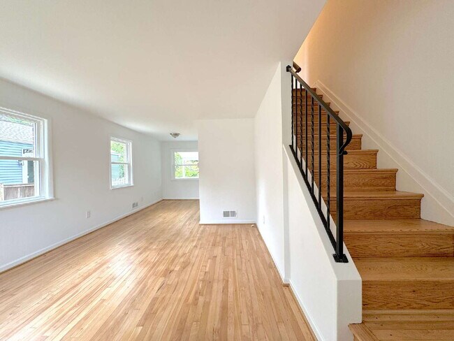 Building Photo - Charming 2BR Townhome with Finished Basement, Fenced Yard & Private Driveway Near Huntington Metro