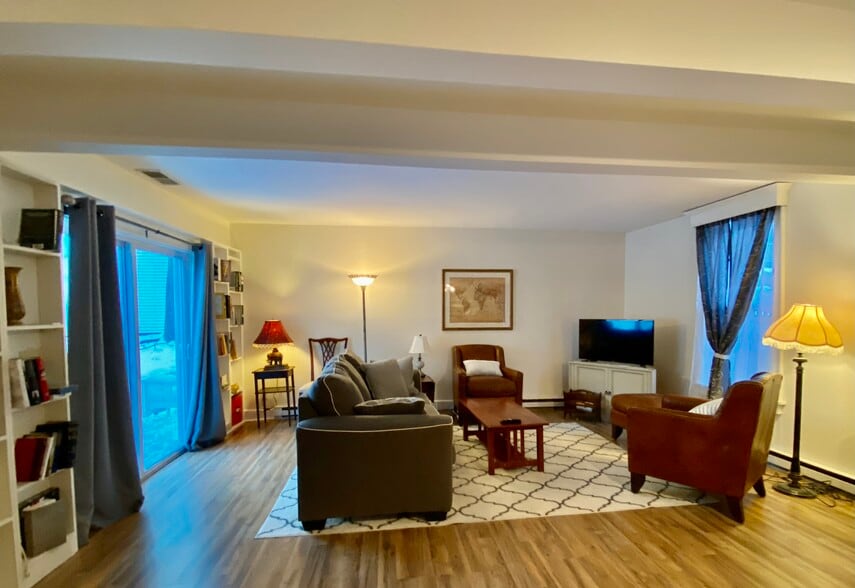 Living area opens to deck - 159 Woodlawn Ave