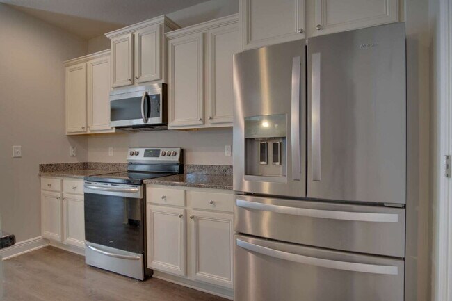 Building Photo - Ashley Plantation Living — 3BR Home with Granite Countertops, Large Kitchen Island, Trey Ceilings...