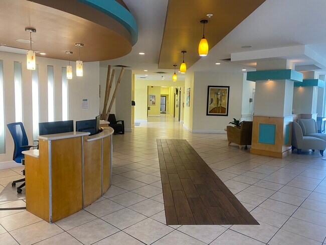 Lobby with nighttime security guards on duty - 470 3rd St S