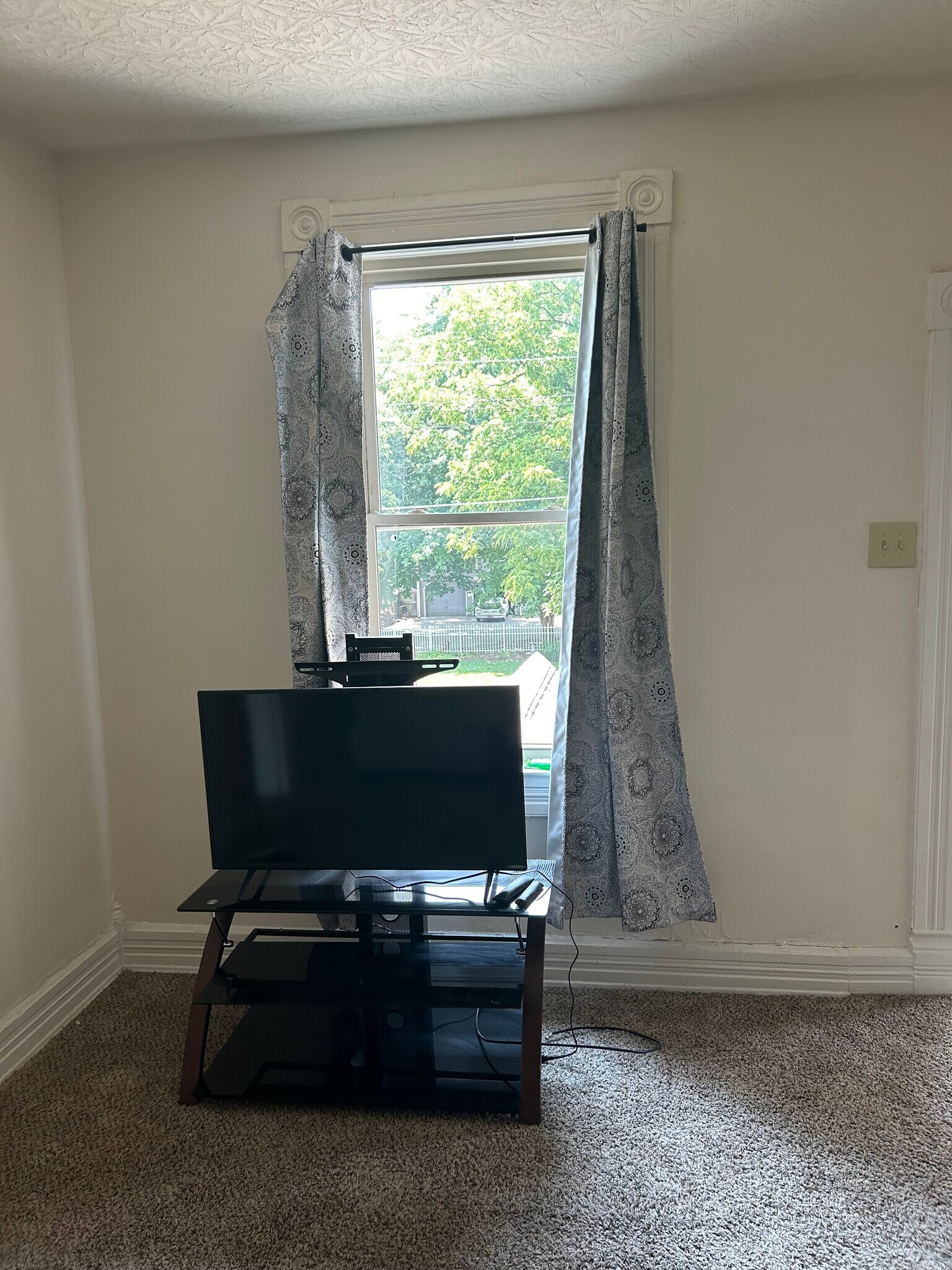 Tv stand in living room - 257 Yankee Rd
