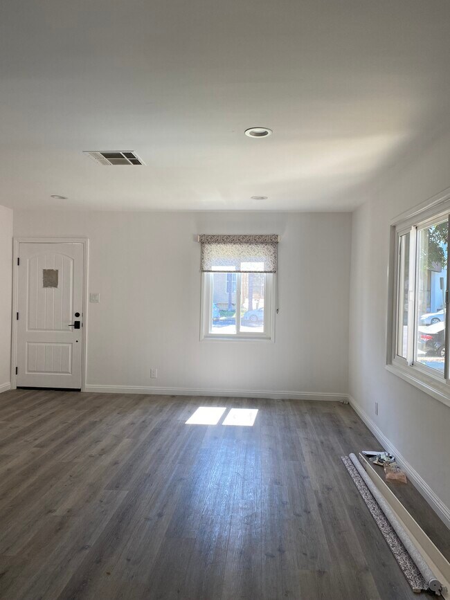 Living room, all new Milgard windows - 17423 Burbank Blvd