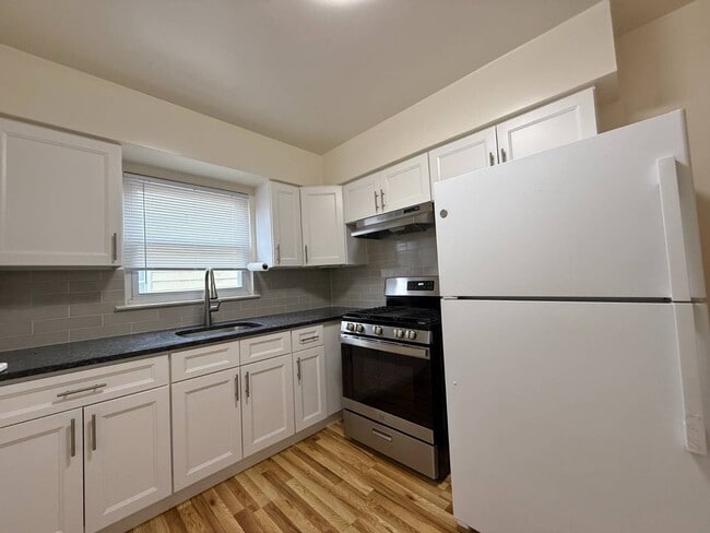 Building Photo - 203-16-203-42 42nd Ave