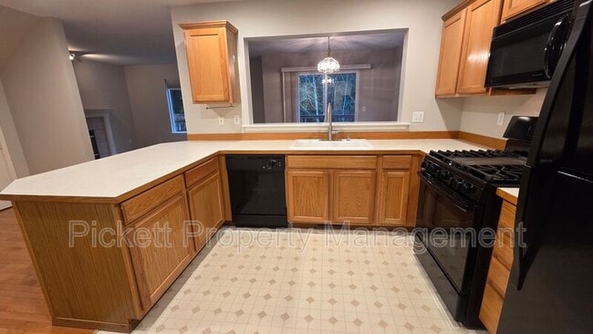 Building Photo - 1010 NW Poppy Ct