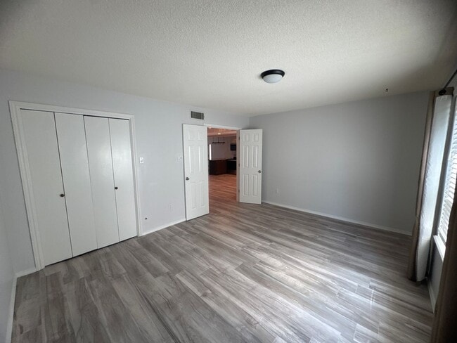 Building Photo - Two-story, four-bedroom, three-bathroom ho...