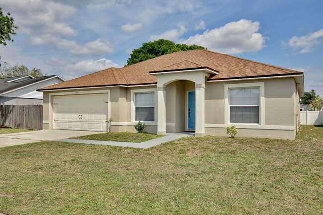Building Photo - Beautiful 3/2 Spacious Home with a covered patio and a 2 Car Garage in Villa Homes Village - St C...