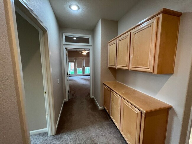 Building Photo - 4 bedrooms with 3 car garage in Rose Lane ...