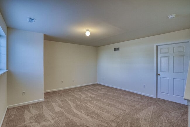 Building Photo - New, New, New - Spacious 3 Bedroom Townhouse with a Finished Basement !!
