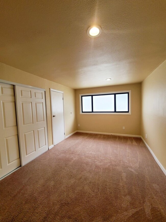 Building Photo - Totally remodeled. Impressive, open floor ...