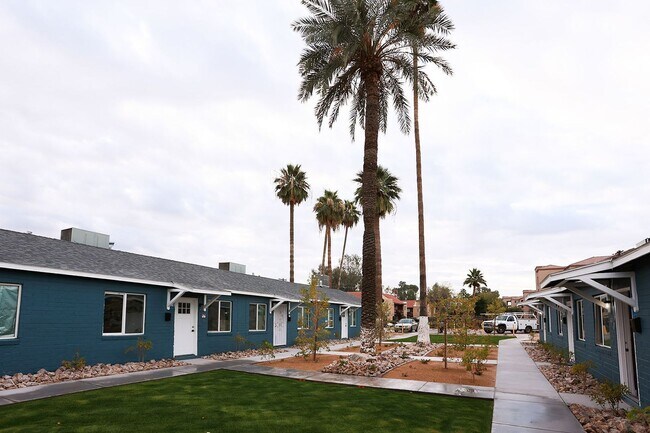 Building Photo - Boutique Living Meets Private Backyards an...