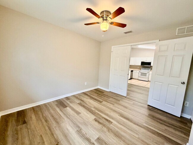 Building Photo - Charming 3BR/2BA Lehigh Acres Duplex with 1-Car Garage | Lawn Care & Salt Service Included