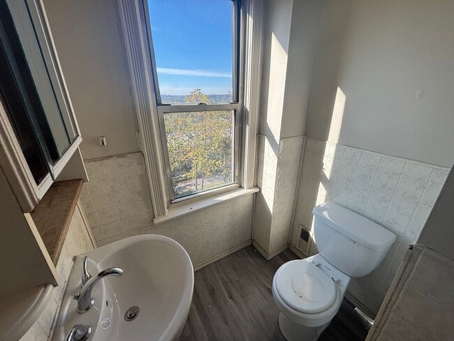 Building Photo - Updated flooring, finished basement, and great outdoor space in a walkable Swissvale location