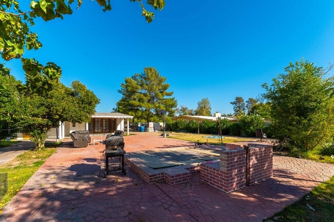 Building Photo - Historic Neighborhood + Utilities Included | 3BR with Backyard Oasis and Detached casita