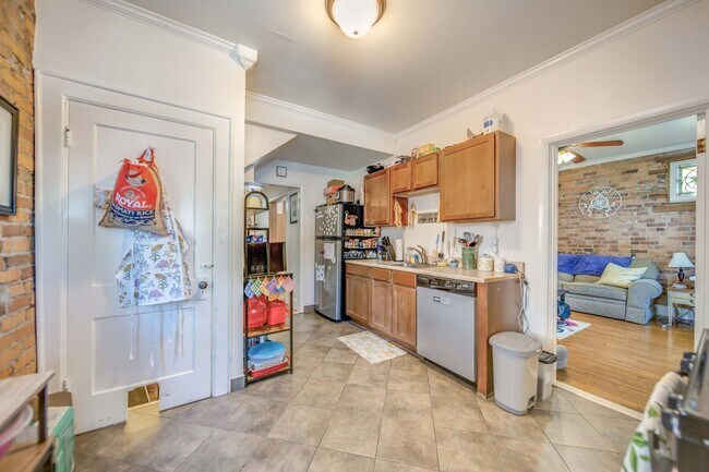 Building Photo - Charming 5-Bedroom Home with Exposed Brick and Modern Upgrades