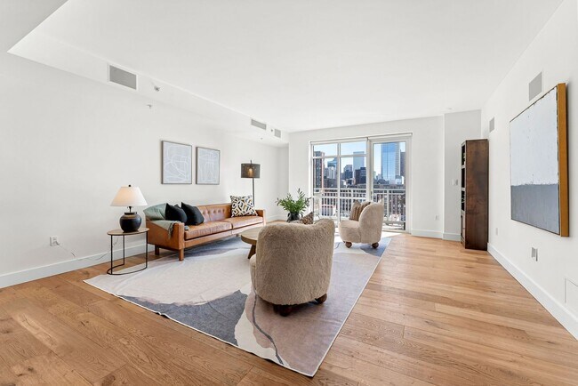 Building Photo - Gorgeous 2 bed, 3 bath Condo w/ 2 Car Gara...
