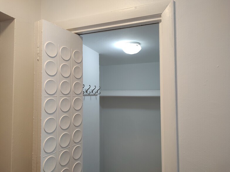 Walk-in coa/storage closet at entrance - 2840 Colonial Ave SW