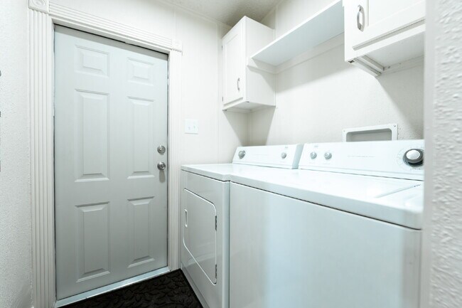 Building Photo - Your Private Theater & 2BR Escape – Where ...
