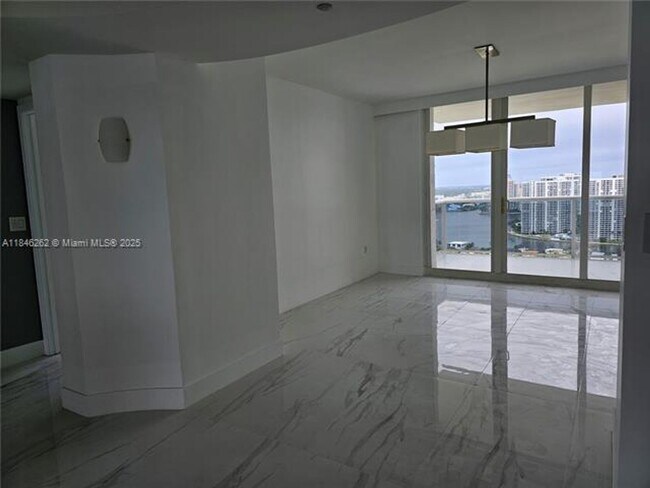 Building Photo - 19111 Collins Ave