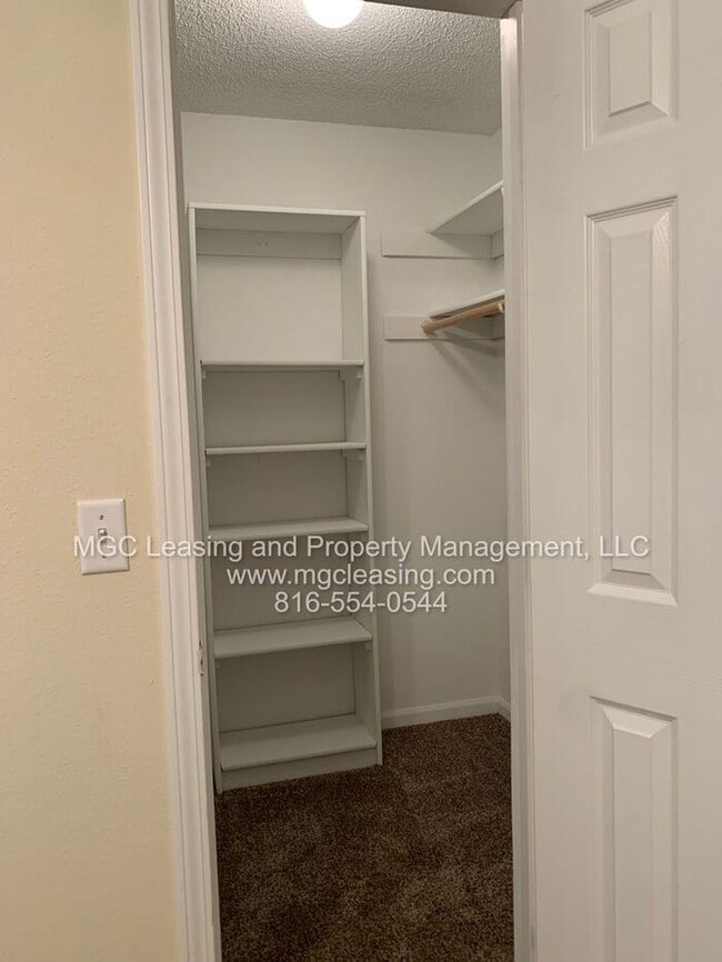 Building Photo - Welcome to Whispering Winds Townhomes – Wh...