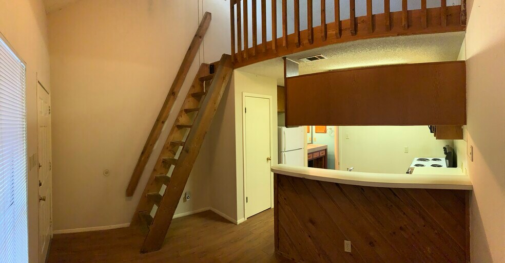 Living room view of kitchen and loft - 2313 Longview St