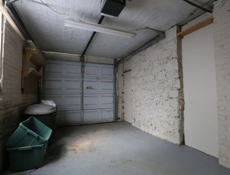 One car garage and unfinished basement room offers lots of extra storage - 121 Brower Street