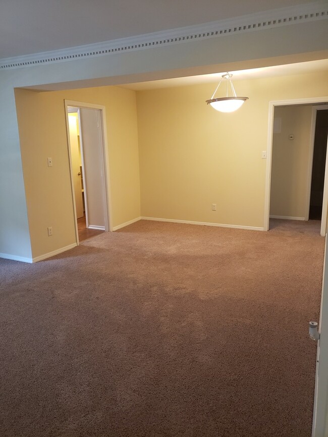 Building Photo - Lake Johnson Mews-3bd on the LAKE TRAIL!