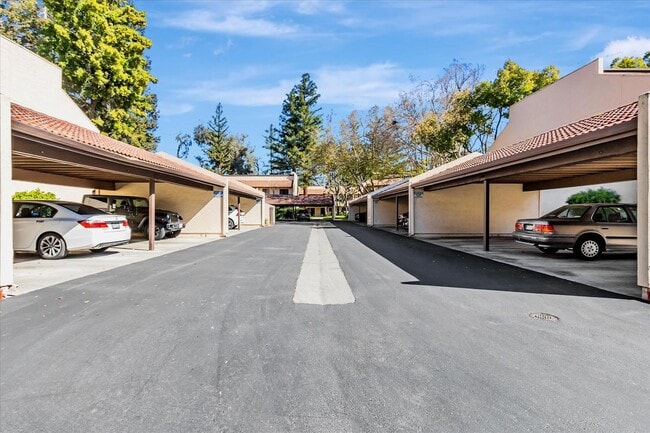 Building Photo - Stylish End-Unit Condo l Private Patio l Community Pool