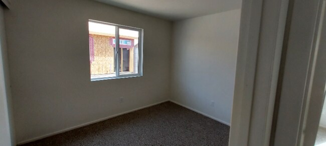 Building Photo - 7809 E 45th Ln