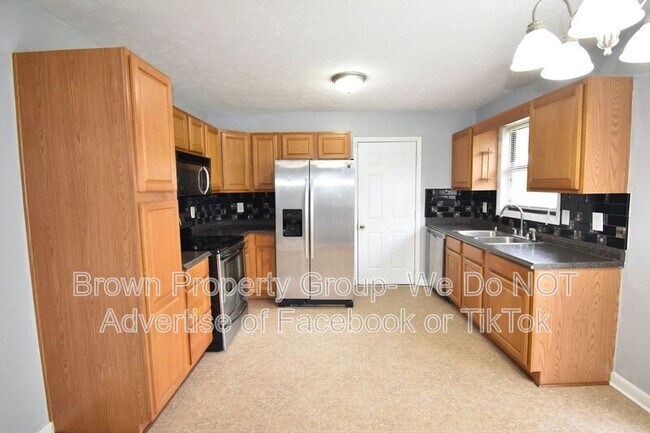 Building Photo - 6897 Kingsgate Dr