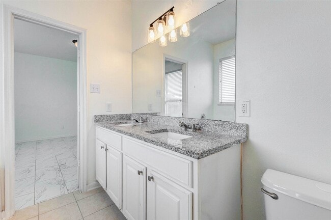 Building Photo - 7434 Jacobs Well Dr