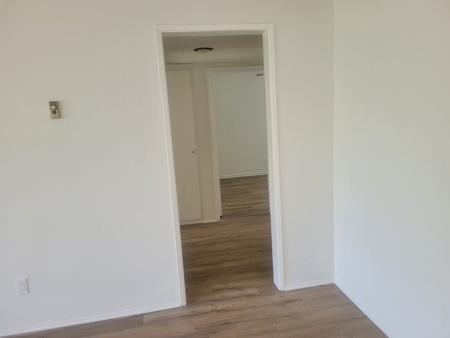 Hallway to bedrooms and tub bath - 21030 Ladeene Ave