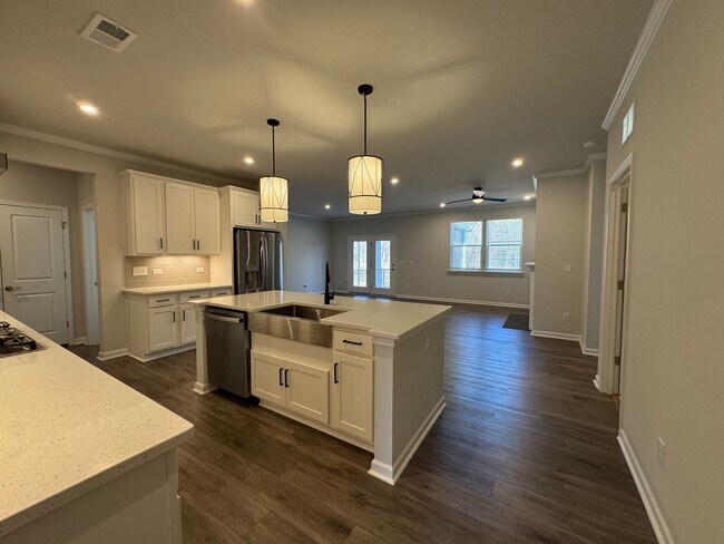 Building Photo - Spacious 1.5-Story 4BR Home with Bonus Room in Active 55+ Community