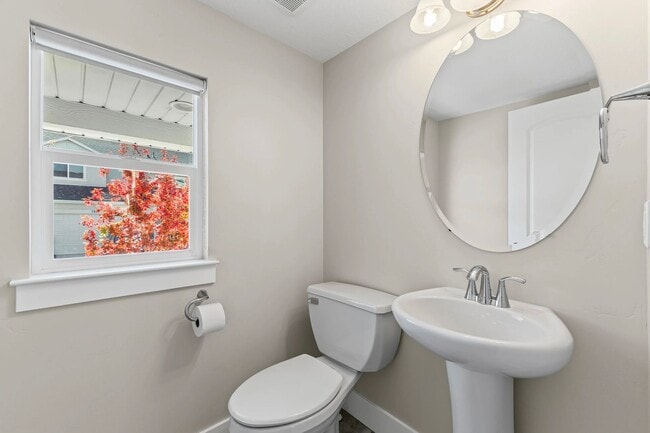 Building Photo - Upgraded 4-Bed Townhome with Finished Base...