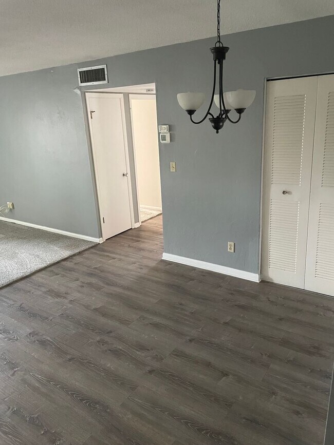 Building Photo - 55+ Charming first-floor condo nestled in the serene Fairways 3 Condominiums