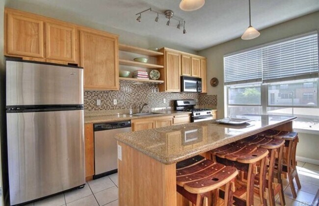 Building Photo - Modern 2BR/2.5BA Condo with Ensuite Bathro...