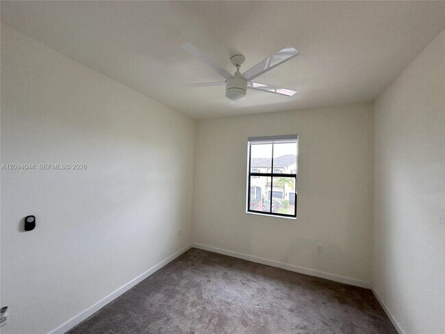 Building Photo - 10306 W 33rd Ln